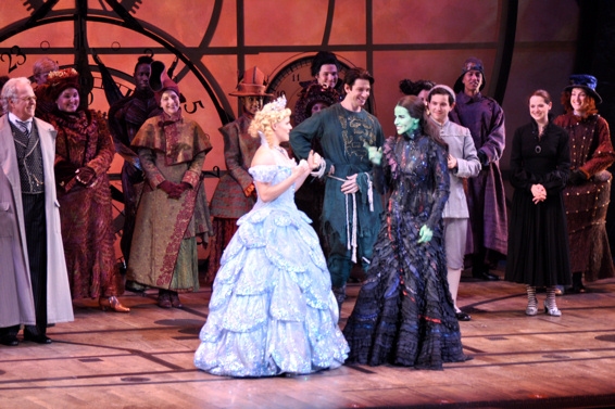 Katie Rose Clarke and Mandy Gonzalez and the cast of Wicked Photo
