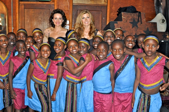 Carla Gugino and Connie Britton with The African Children's Choir Photo
