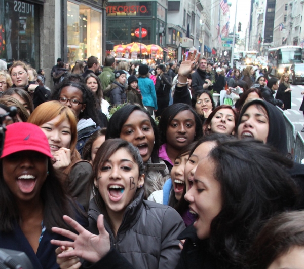 Fans participate in a Justin Bieber Sing-a-Long Photo