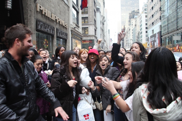 Fans participate in a Justin Bieber Sing-a-Long Photo