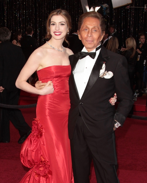 Anne Hathaway; Valentino pictured at the 83rd Annual Academy Awards - Arrivals held a Photo