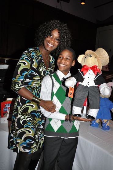 The Scottsboro Boys Bear with Jeremy Gumbs and his mother Deborah Gumbs Photo