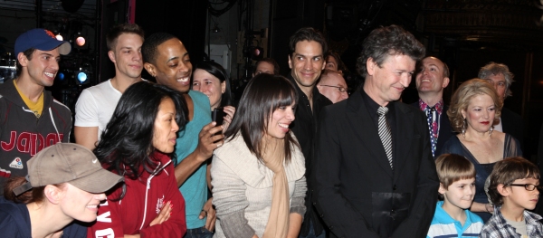 Director Simon Phillips with the ensemble cast viewing video Greetings at the Broadwa Photo