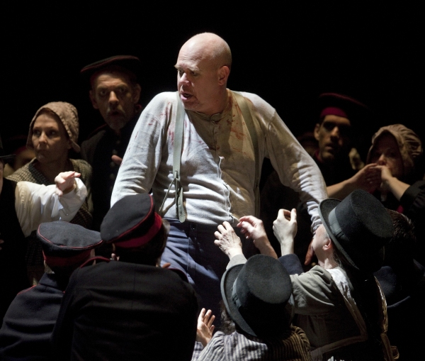 Alan Held (center) in the title role of Berg's "Wozzeck." Photo: Cory Weaver/Metropol Photo