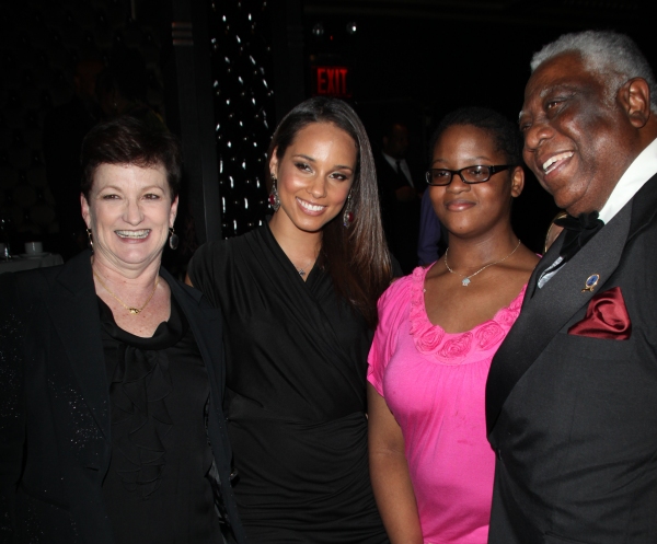 Terria Joseph & daughter Alicia Keys with Woodie King Jr. attending the Woodie King J Photo