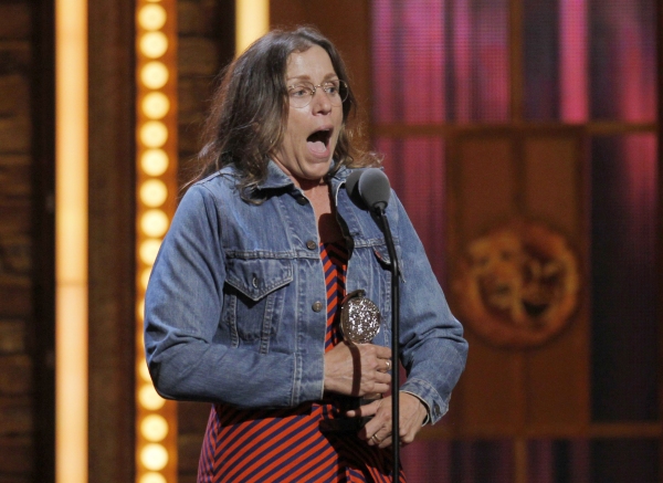 Frances McDormand celebrates after being presented the award for best performance by  Photo