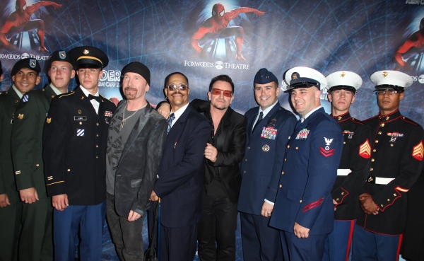 The Edge and Bono with Every Day Heroes attending the Opening Night Performance of 'S Photo