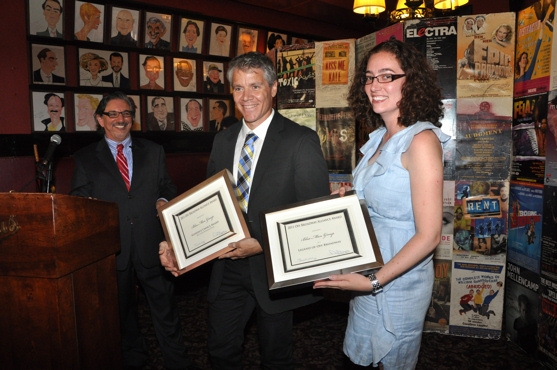 Colin Lewellyn and Danielle Pakradooni accepting the Award for the Best Long-Running  Photo