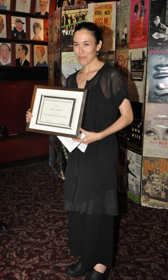 Mia Yu accepting the Award for Ellen Stewart as she is inducted into the Off Broadway Photo