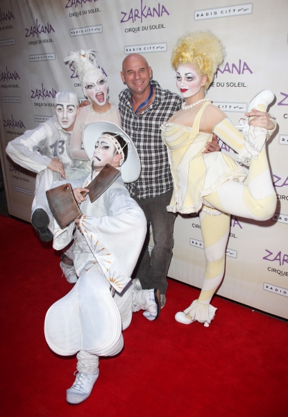 Cique du Soleil founder Guy Laliberte with Characters of Zarkana attending the Openin Photo