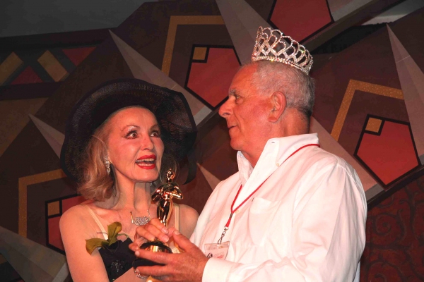 Julie Newmar presents and crowns John White with a Best of Show. Photo