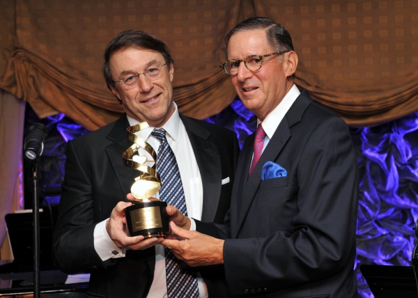 Board Chairman Ed Stern presented the Music Has Power Award to film director/producer Photo