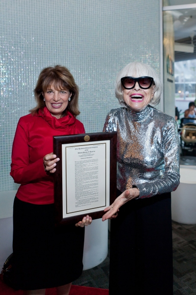 Congresswoman Jackie Speier presents a framed copy of Resolution 275 to Carol Channin Photo