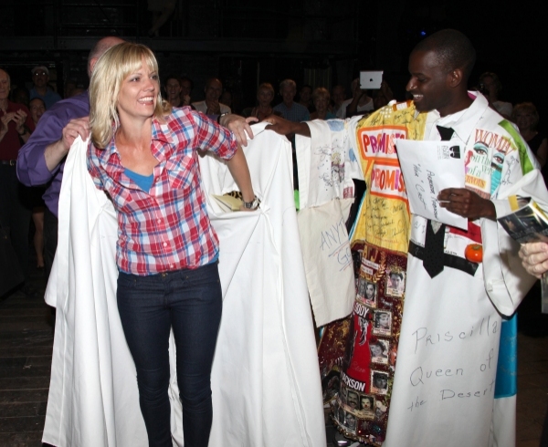 Jenifer Foote receives the Gypsy Robe from HAIR's Arbender Robinson. Photo