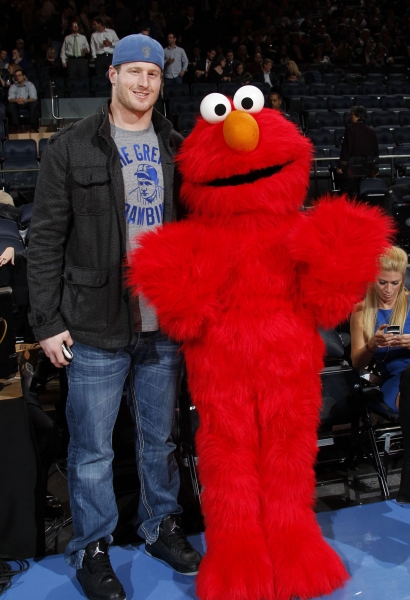 Elmo poses with New York Giant Jake Ballard Photo