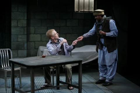 John Hickok as Nick and Ahmed Hassan as Dar Photo