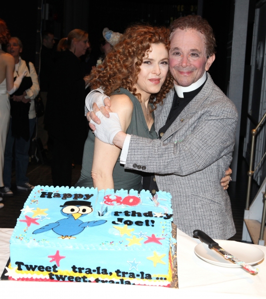 Bernadette Peters surprises Joel Grey on his 80th birthday with a cake backstage at 