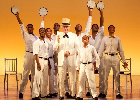 Ron Holgate as The Interlocutor (center) and the Cast of The Scottsboro Boys Photo