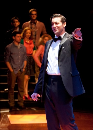 Heath Calvert as Byron (foreground) and the cast of the World Premiere musical Nobody Photo