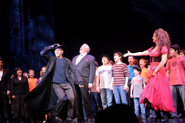 Brian Stokes Mitchell, Jim Brochu, Melissa Errico and the company of Oliver
 Photo