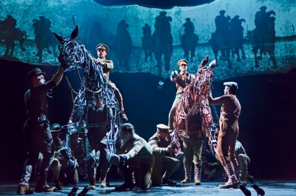 Grayson DeJesus and Michael Wyatt Cox (on horseback) with the Cast of WAR HORSE Photo