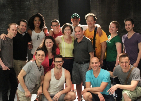 Stephen Flaherty (center) surrounded by the SILENCE! The Musical Company Photo